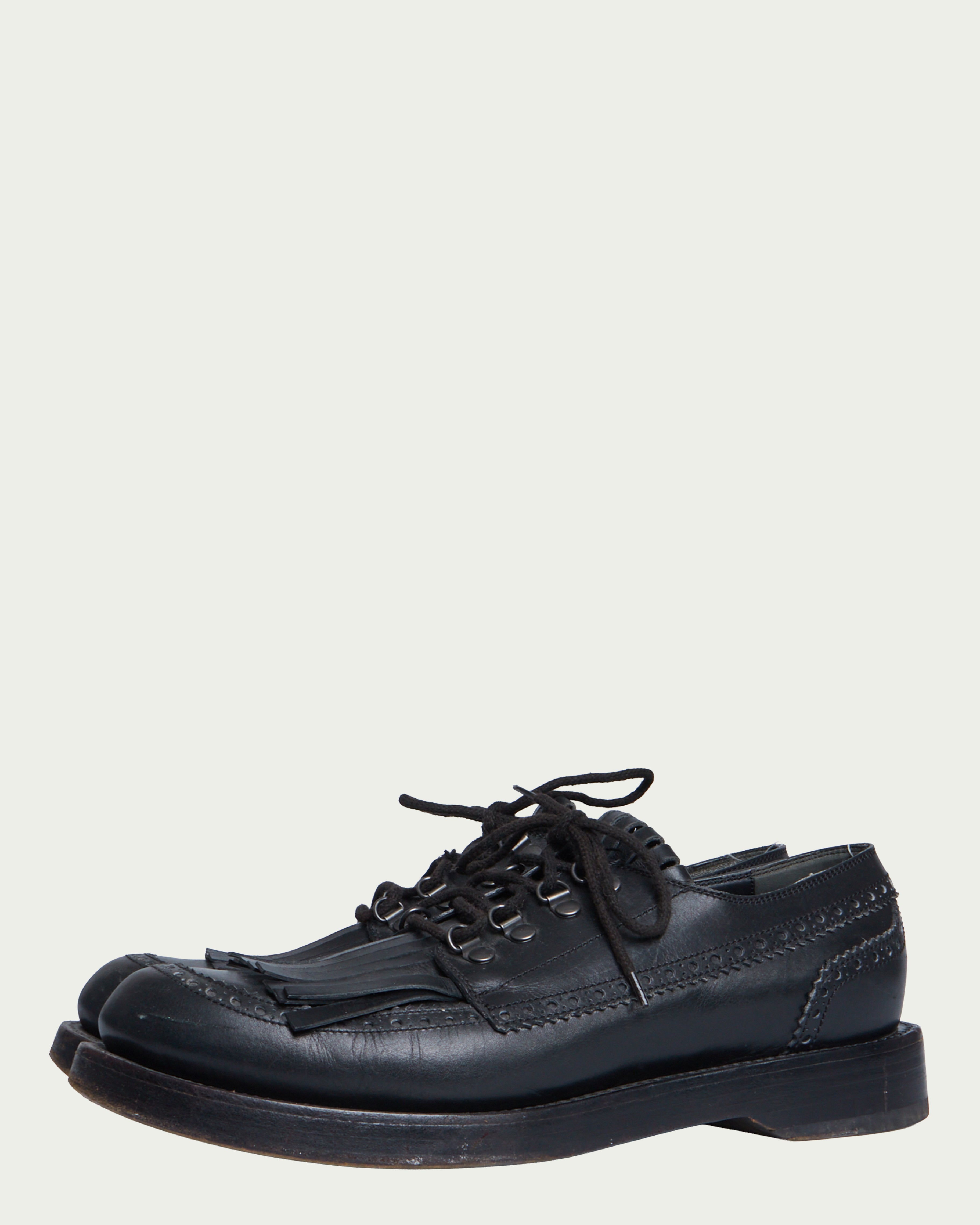 Gucci fringe leather loafers