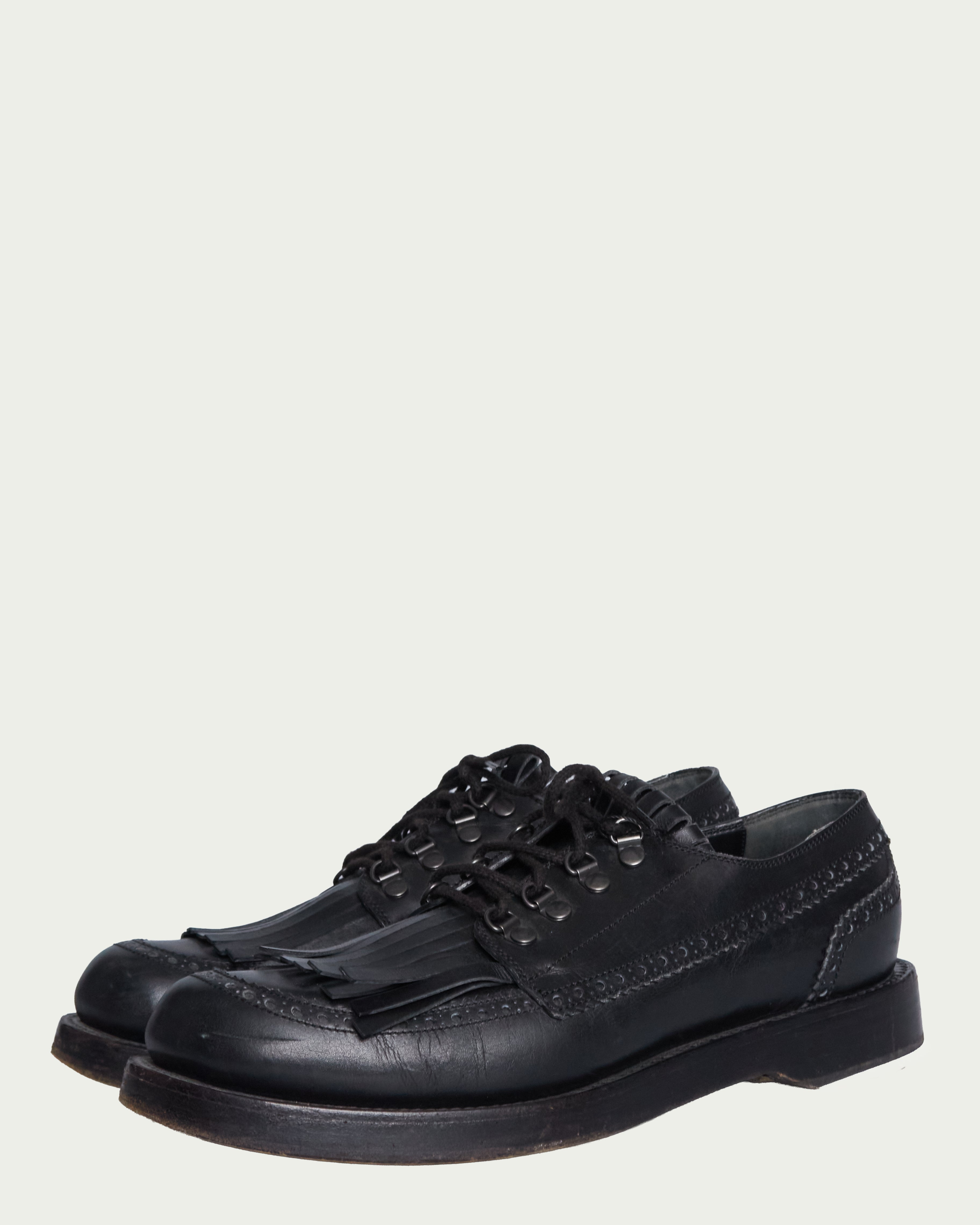 Gucci fringe leather lace ups