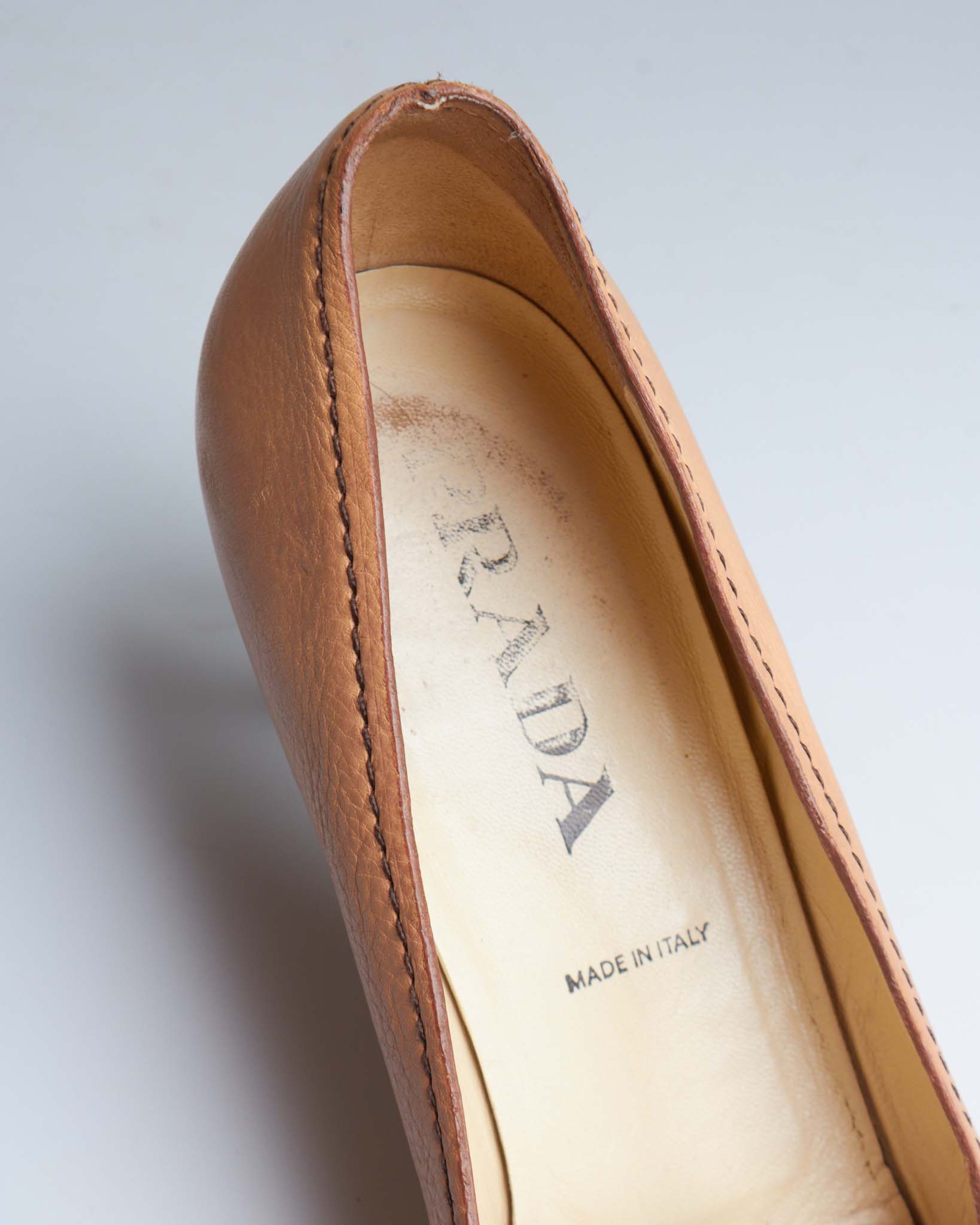 Prada two-tone buckle heels