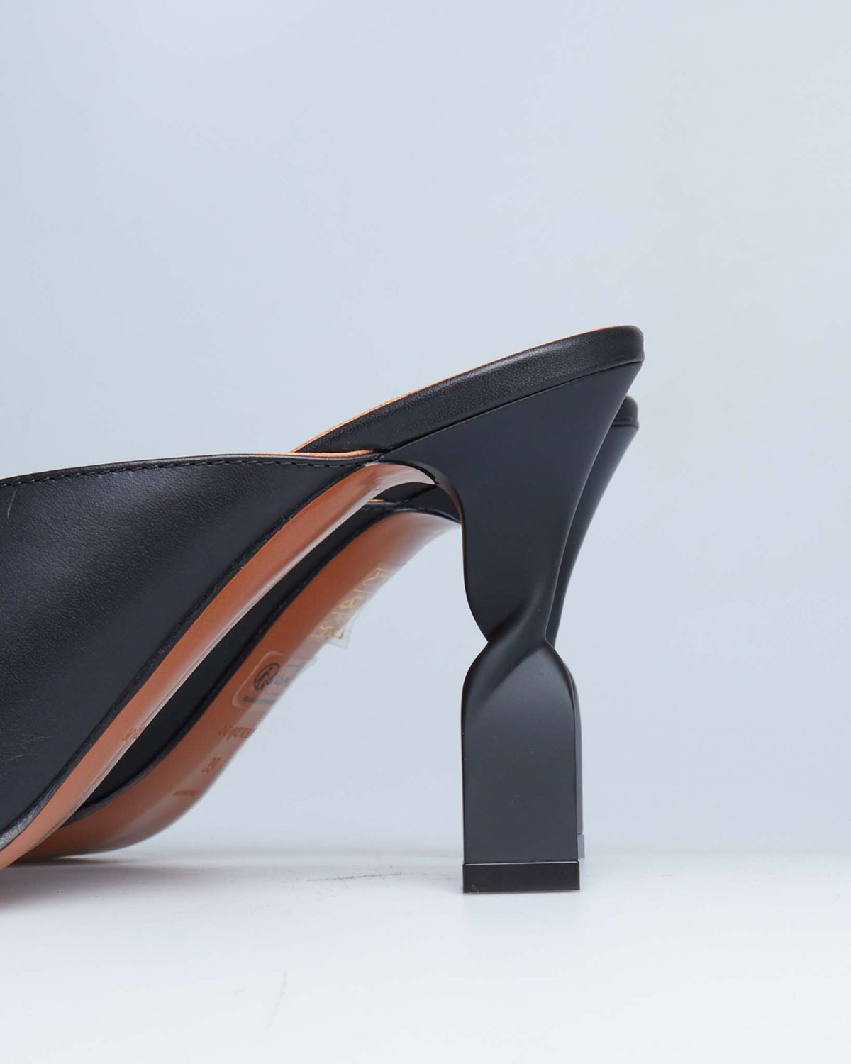 Alexander McQueen leather swivel mules