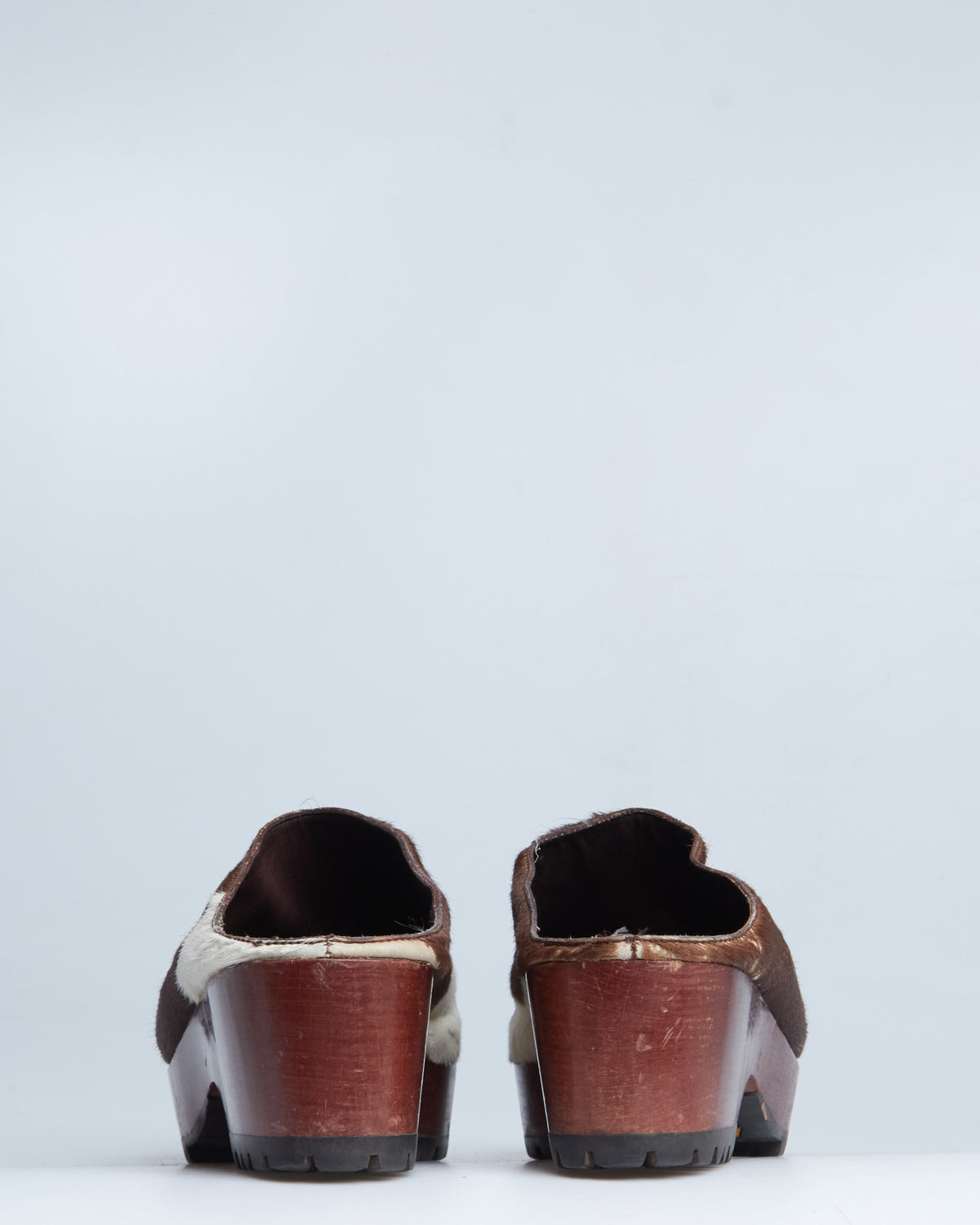 Miu Miu cow-print calf-hair clogs