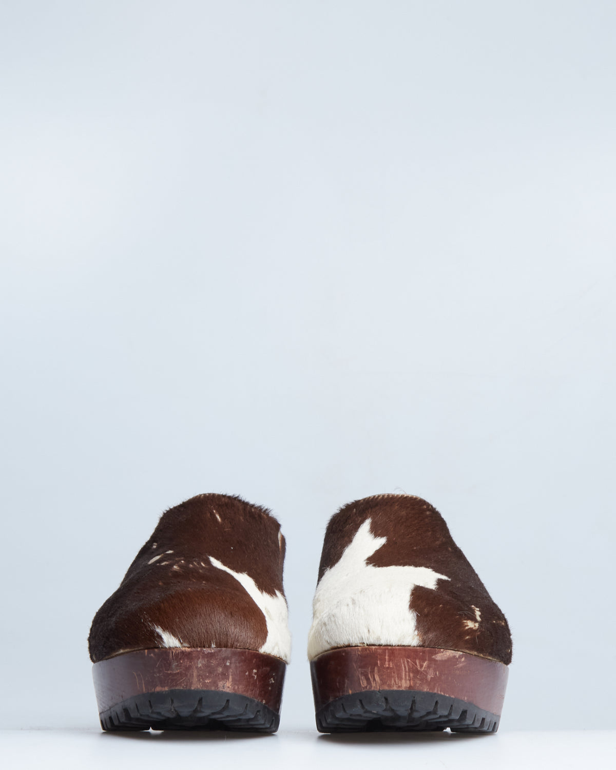 Miu Miu cow-print calf-hair clogs