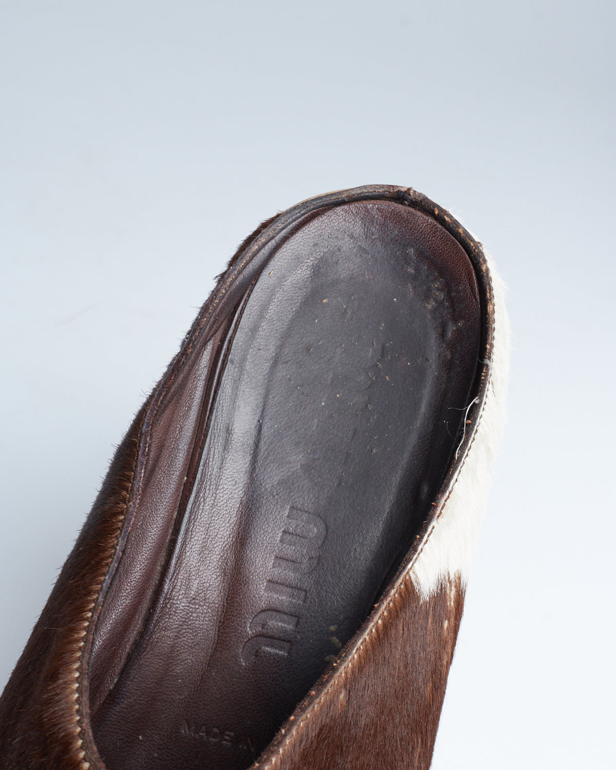 Miu Miu cow-print calf-hair clogs