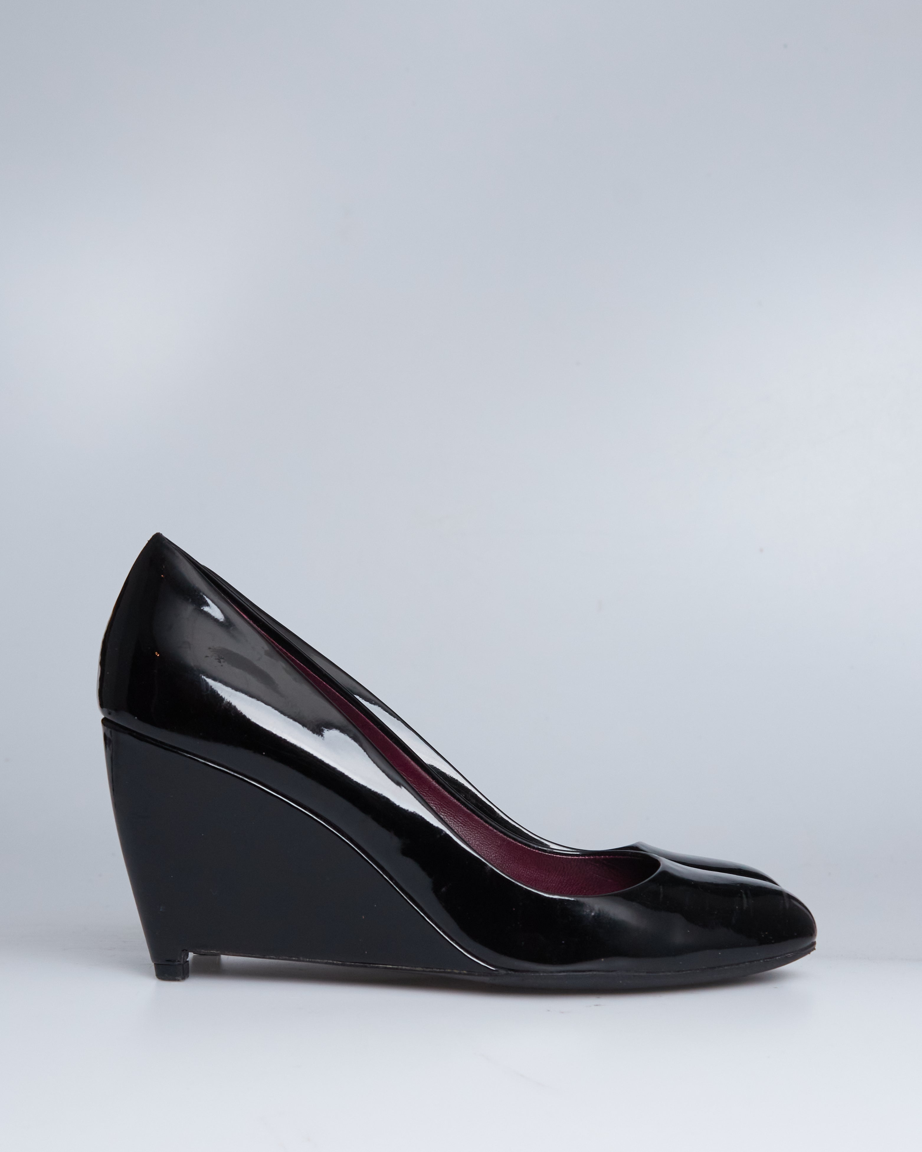 Miu Miu patent leather wedge pumps