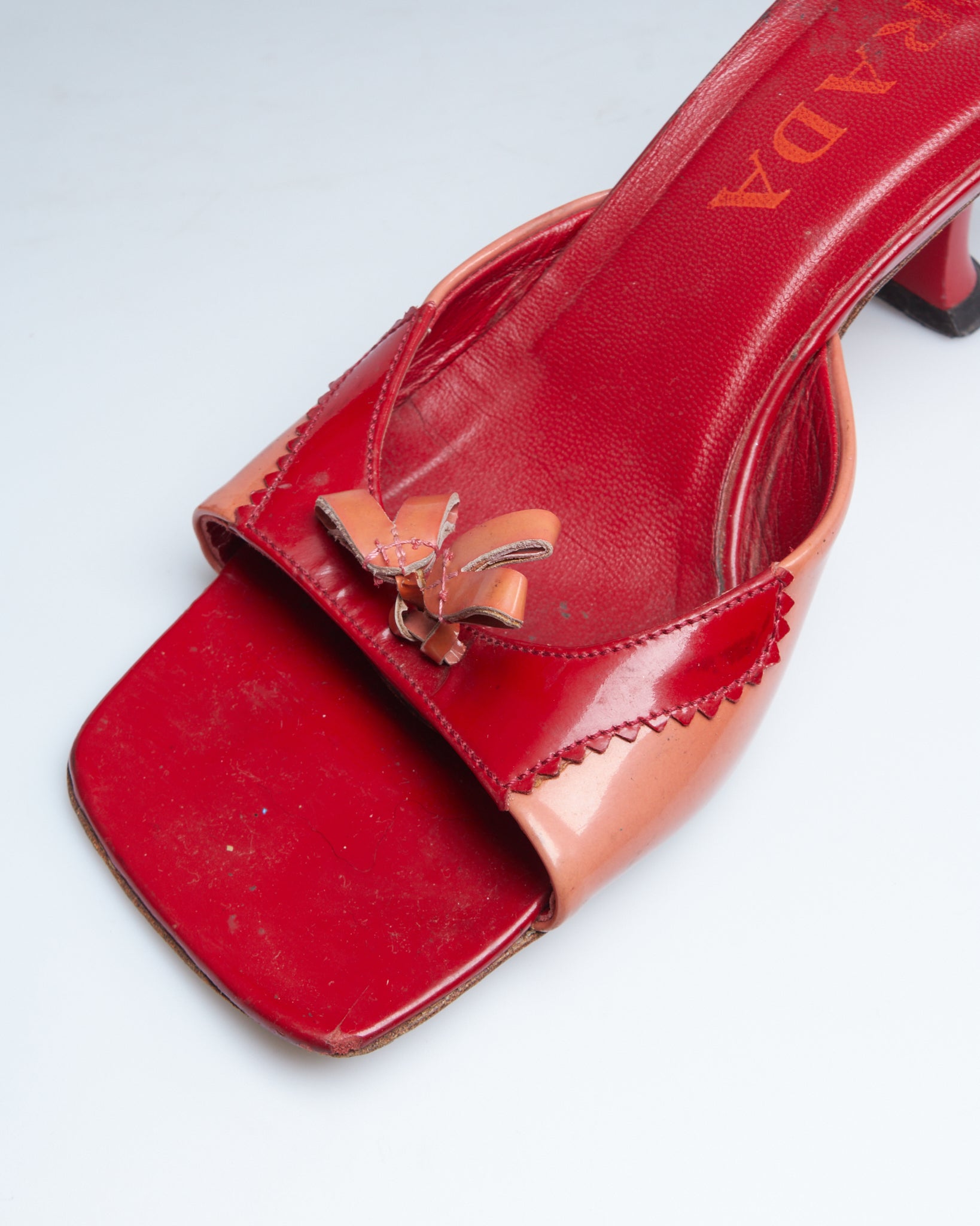 Prada patent tassel mules