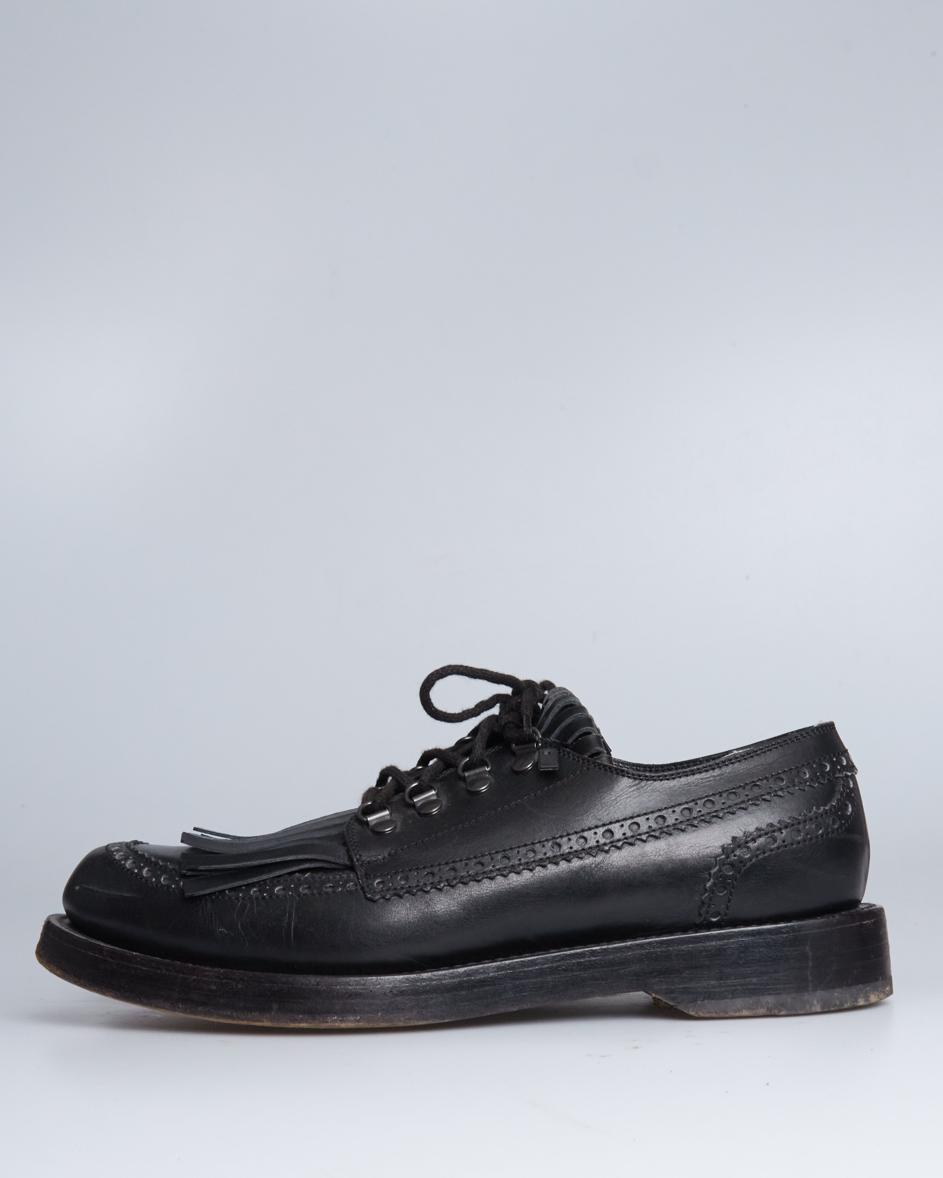 Gucci fringe leather lace ups