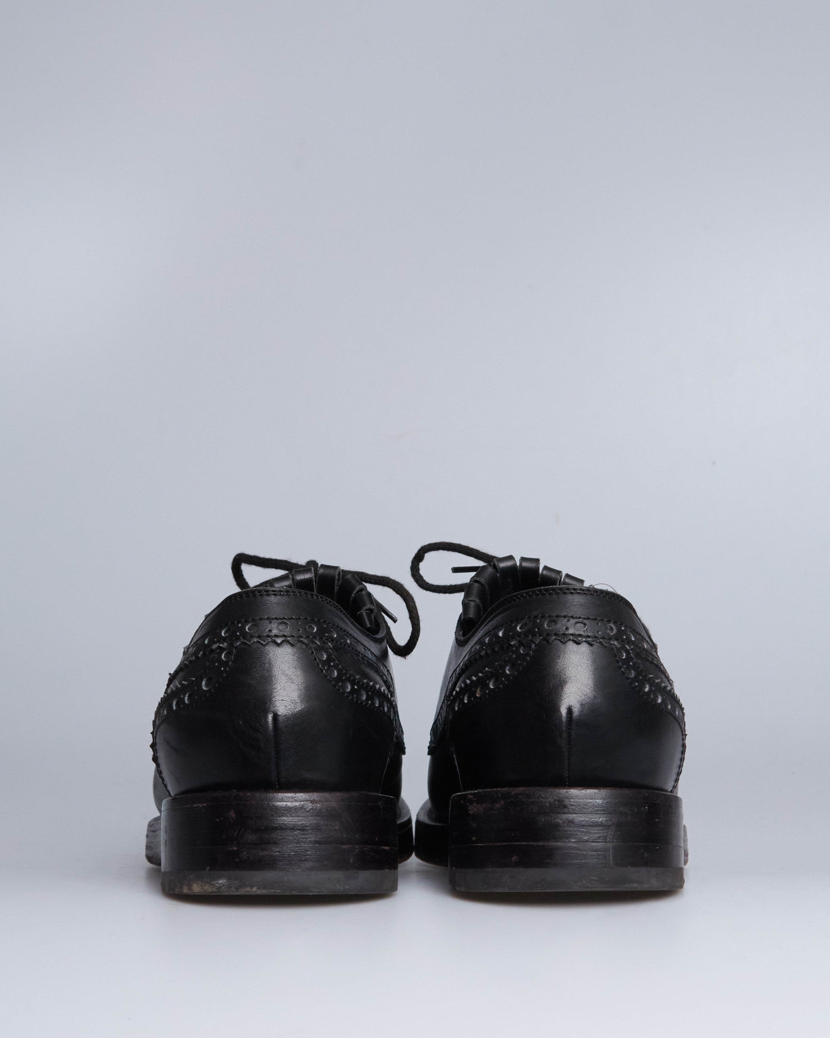 Gucci fringe leather lace ups