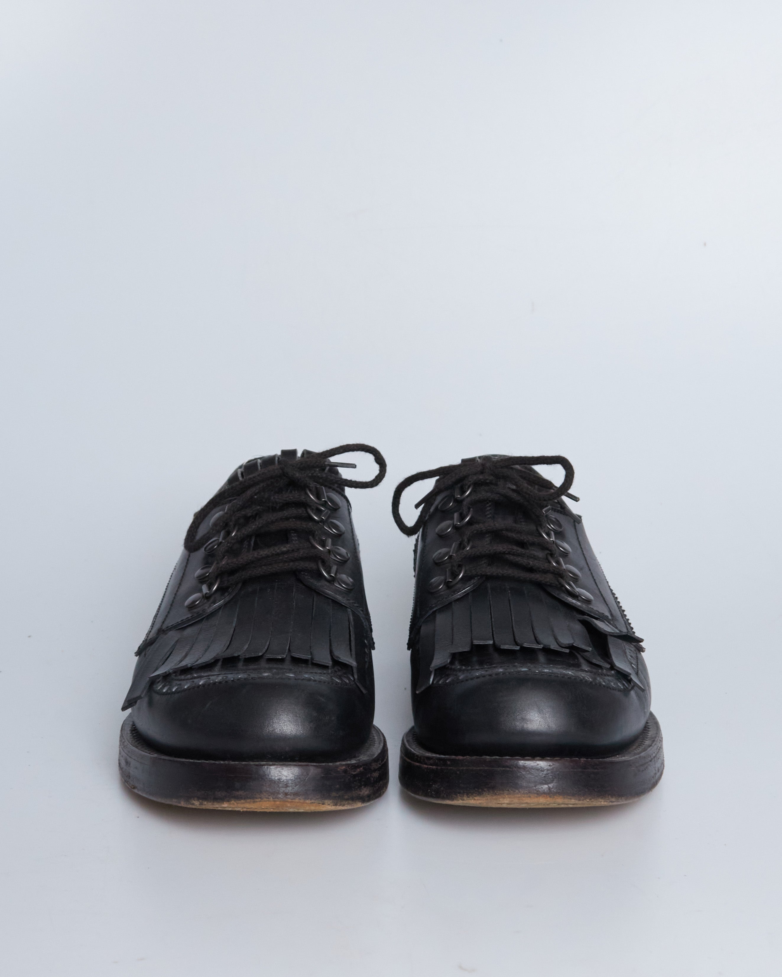 Gucci fringe leather lace ups