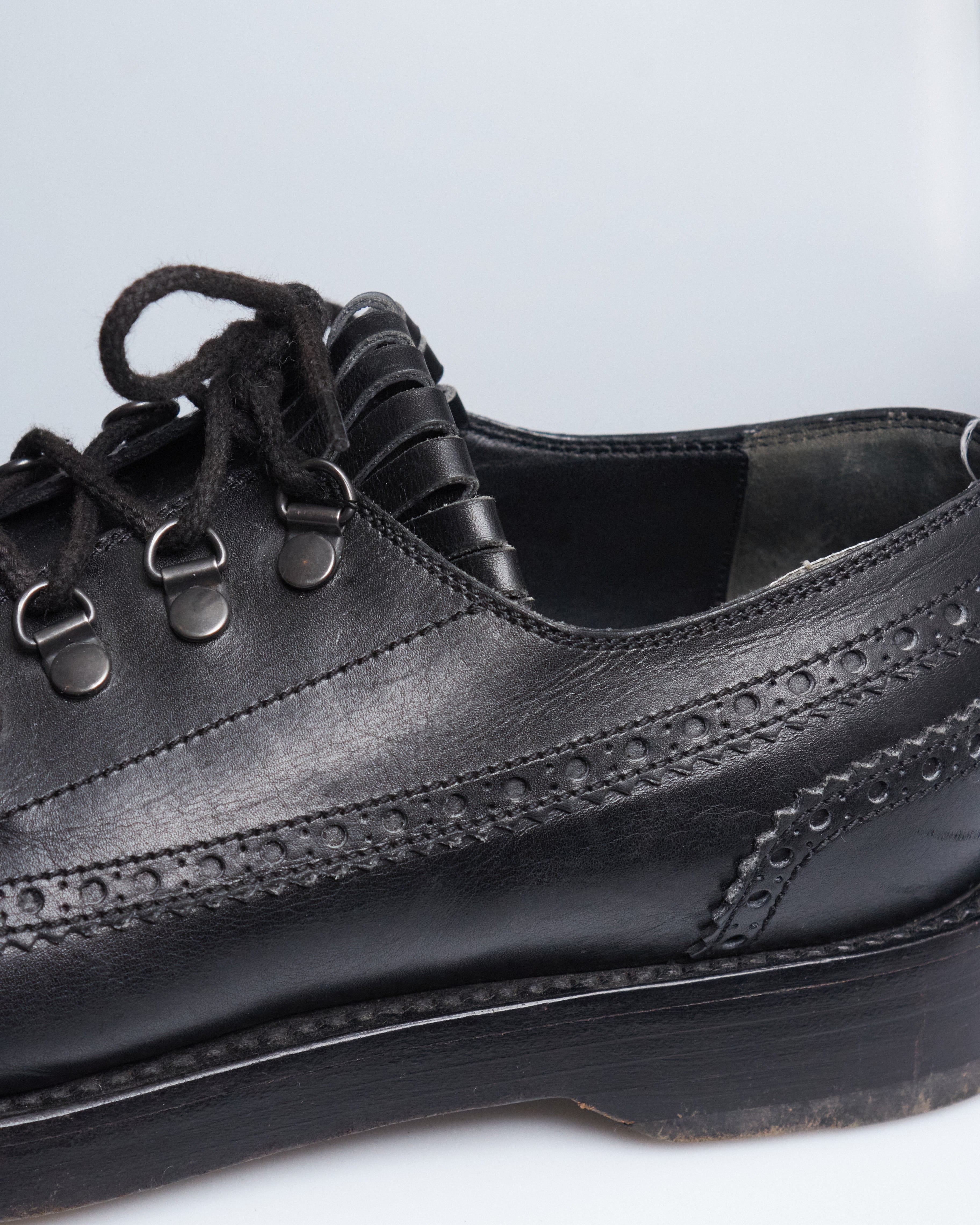 Gucci fringe leather lace ups