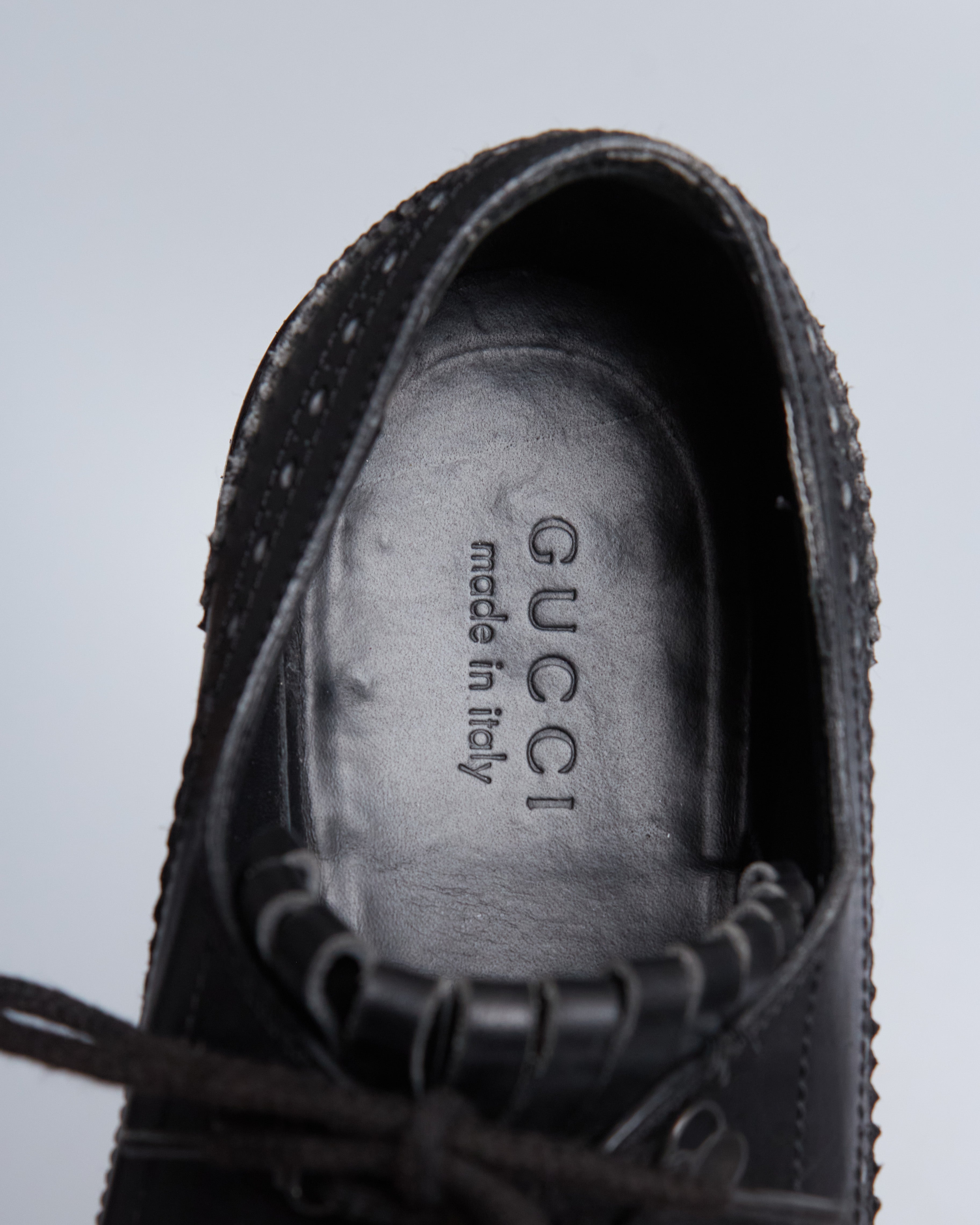 Gucci fringe leather lace ups