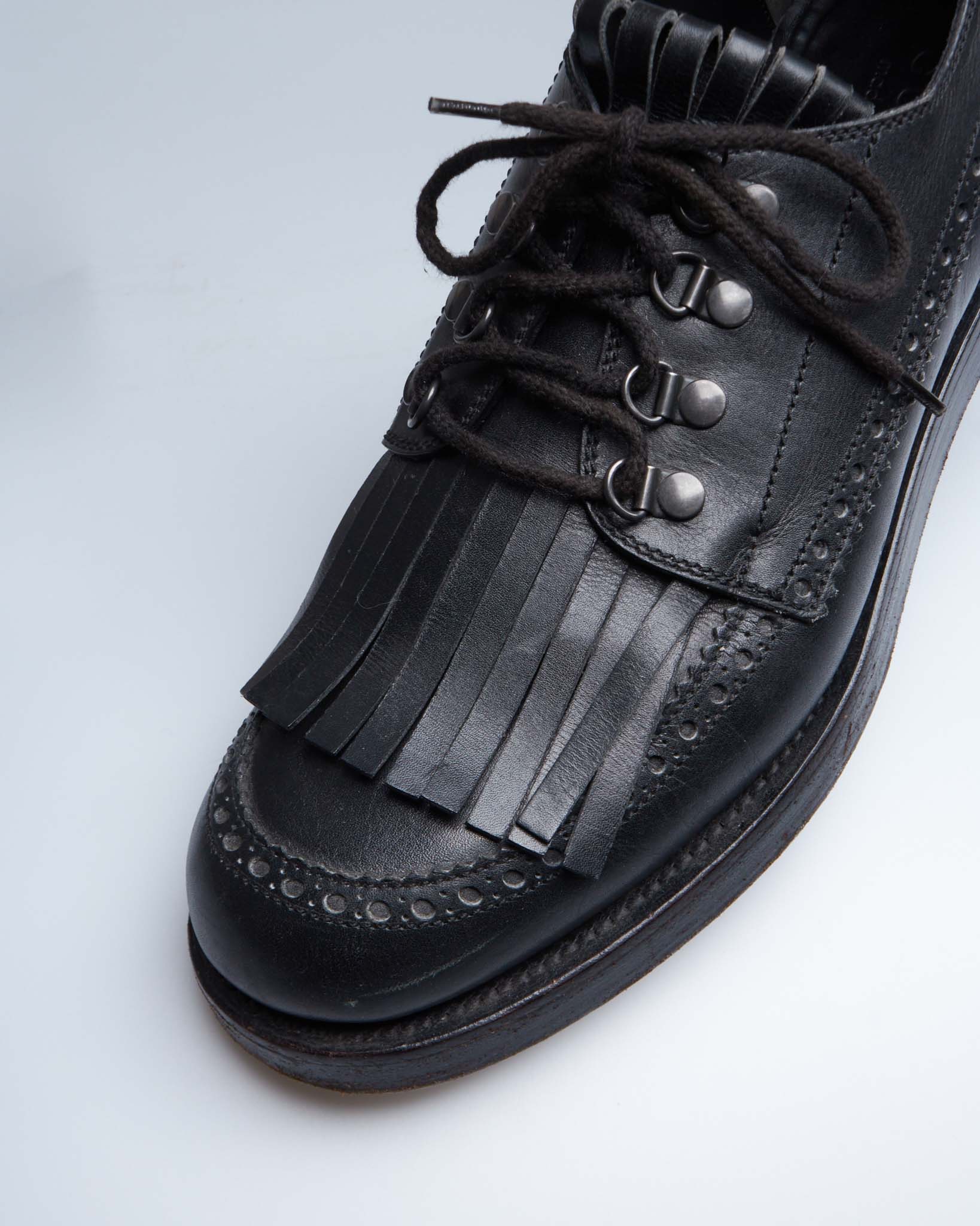 Gucci fringe leather loafers