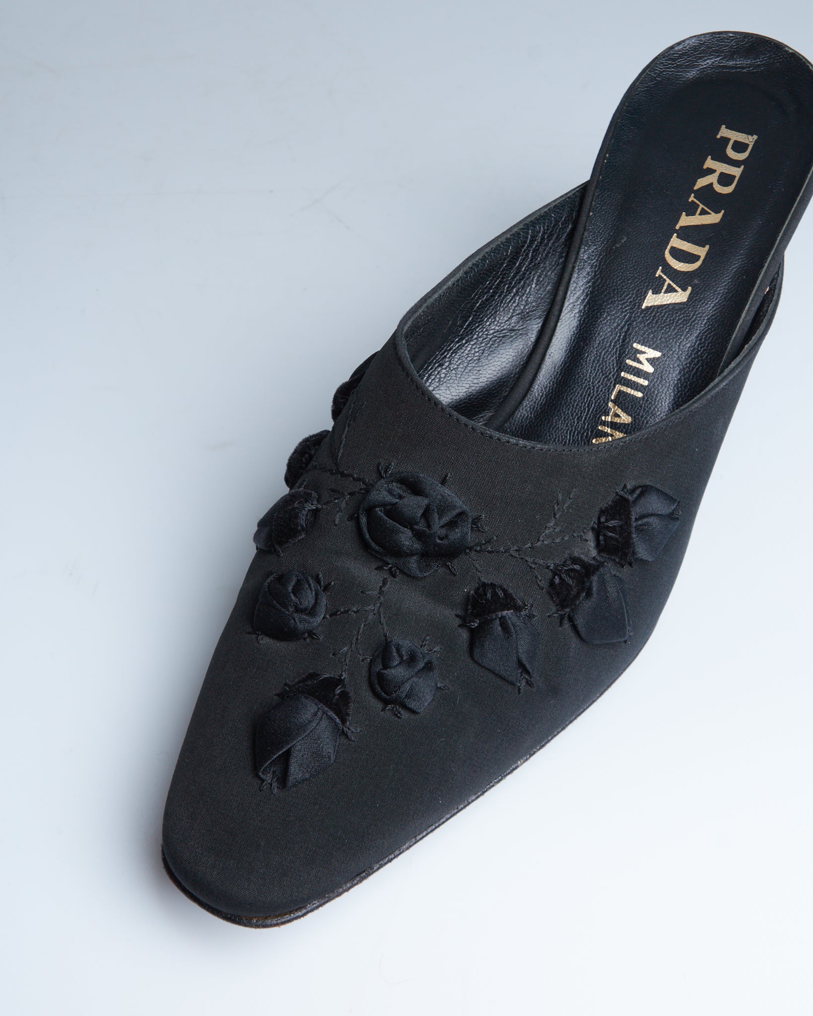 Prada braided mules