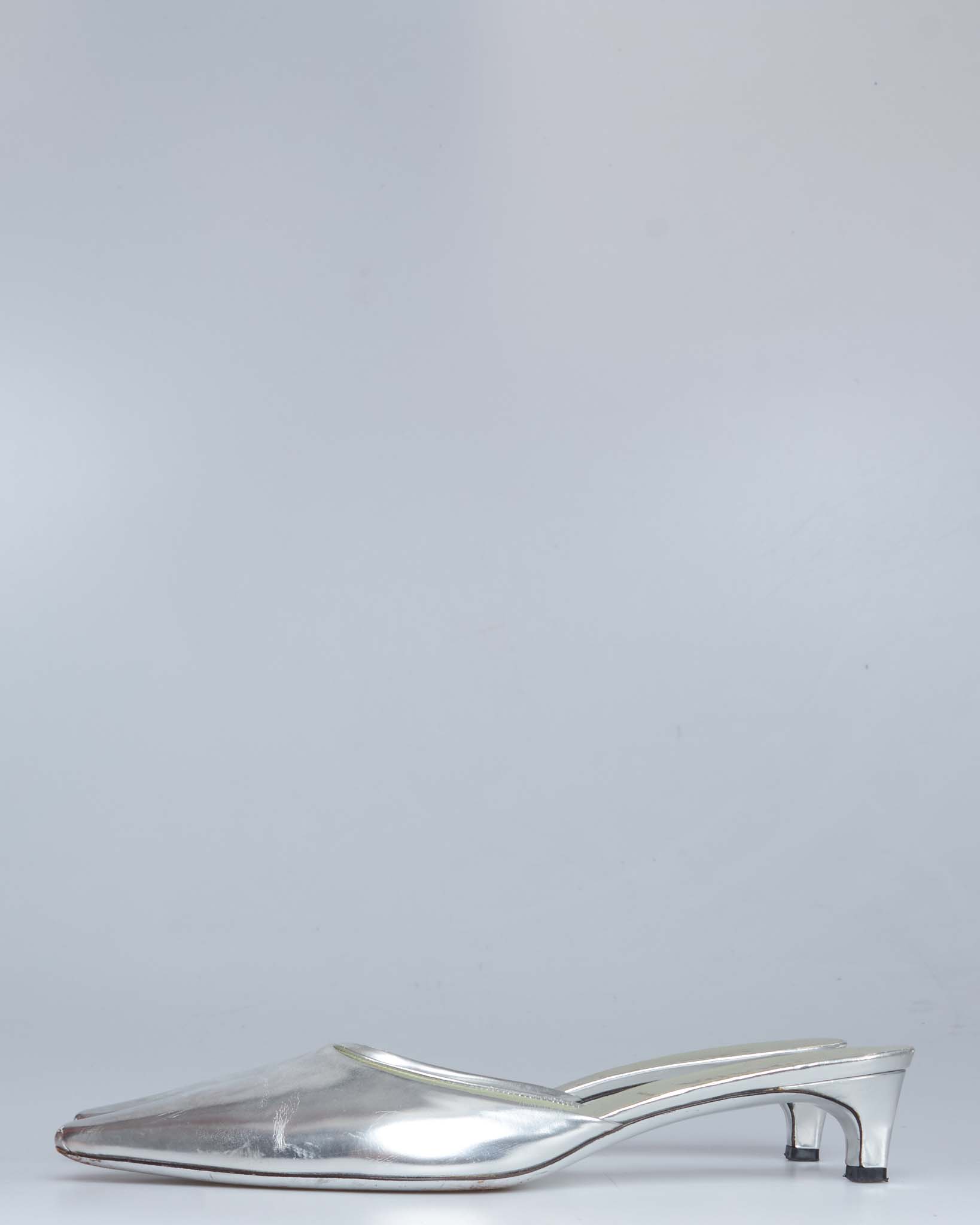 Prada silver metallic pointed-toe mules