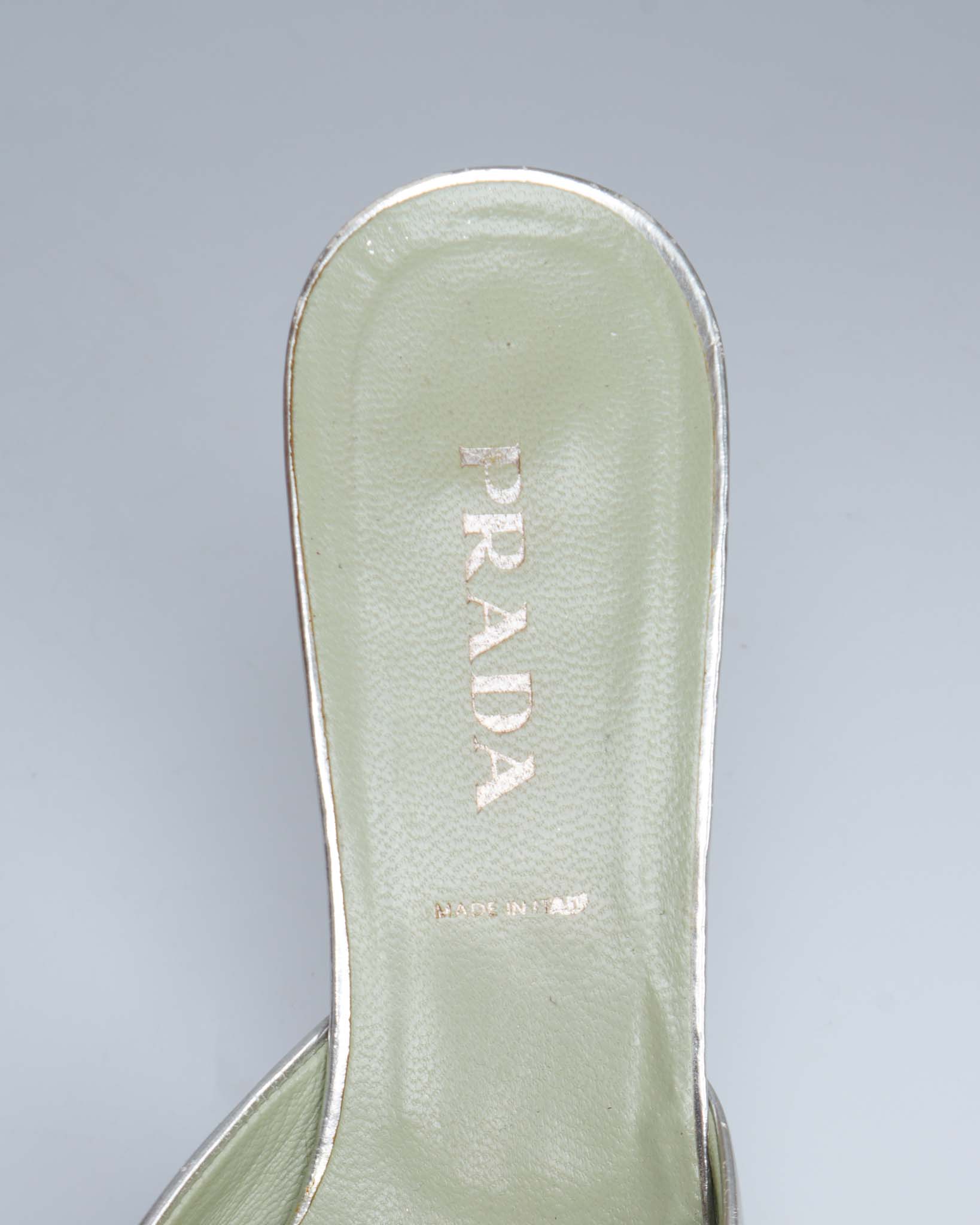 Prada silver metallic pointed-toe mules